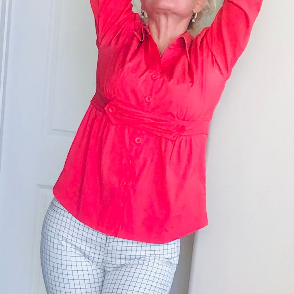 Coral blouse.